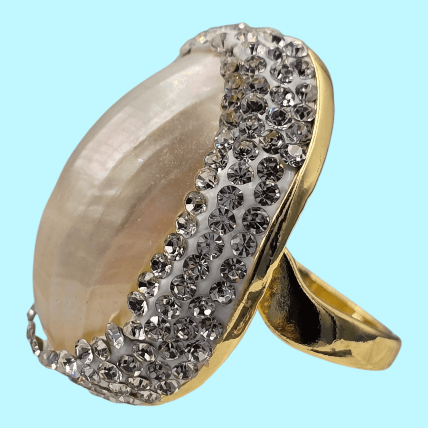 Elegant Gold-Plated Mother of Pearl Ring with white Austrian Crystals